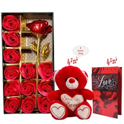 Sensual Artificial Roses with Singing Teddy N Musical Greetings Card Combo to Rourkela