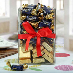 Heavenly Cadbury Eclairs n Handmade Chocolate in a Glass Jar Pack to Alwaye