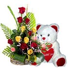Glorious 15 bright Roses and tiny Teddy Bear