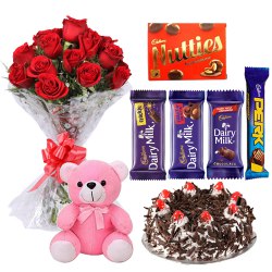 Dutch Roses Bouquet with Cake, Teddy N Assorted Cadbury Chocolates  to Rajamundri