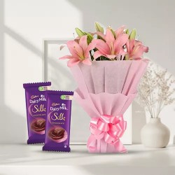 Anniversary Dramatic Pink Lilies Bouquet and Dairy Milk Silk Chocolates