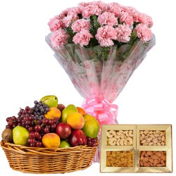 Pleasant Selection of Fresh Fruits Basket with Mixed Dry Fruits and Pink Carnations Basket to Irinjalakuda