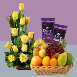 Outstanding Combo Pack of Roses with Fruits Basket and Dairy Milk Silk