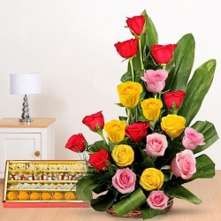 Resplendent 20 Roses and tasty assorted Sweets to Alwaye