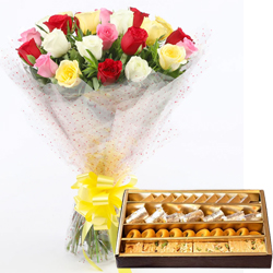 Resplendent 20 Roses and tasty assorted Sweets to Uthagamandalam