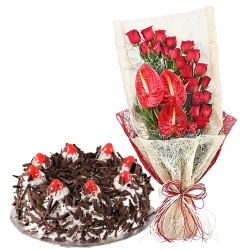 Captivating Red Roses n Anthodium Bouquet with Black Forest Cake