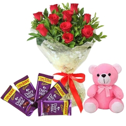 Delightful Gift of Rose Bouquet with Cute Teddy n Cadbury Chocolates