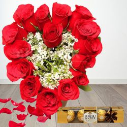 Lovely Heart-Shape Display of Red Roses in Vase and Ferrero Rocher Gift Combo