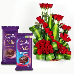 Lovely Red Roses Arrangement with Cadbury Silk Pair