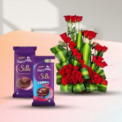 Lovely Red Roses Arrangement with Cadbury Silk Pair