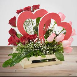 Pristine Basket Arrangement of Red N Pink Roses with Twin Heart Prop