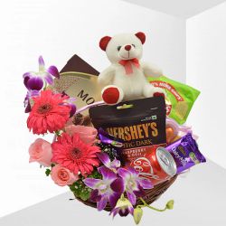 Delectable Gourmet Basket Decorated with Flowers n Teddy