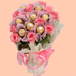 Beautiful Ferrero Rocher N Pink Rose Bouquet for Mothers Day	 to Punalur