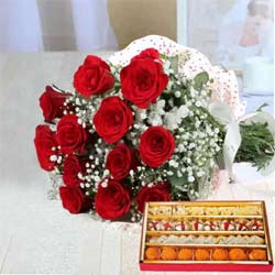 Stunning Red Roses along with yummy assorted Sweets to Kanyakumari