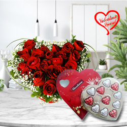 12 Dutch Red Roses in Heart Shape Arrangement and Heart Shaped Delicious Chocolate Box to India