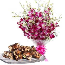 Appetizing Dry Fruit Halwa from Ananda Bhawan with Orchids Bouquet