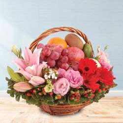 Breathtaking Fresh Fruit Basket with Flowers for Moms Day