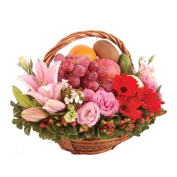 Artistic Basket of Fresh Fruits decorated with Lily, Roses n Gerberas