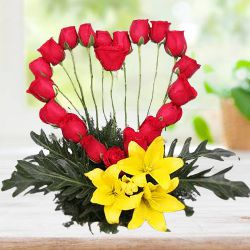 Beautifying Red Roses Heart with Lilies Arrangement