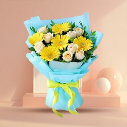 Eye-Catching White Roses n Yellow Gerberas Tissue Wrap Bouquet