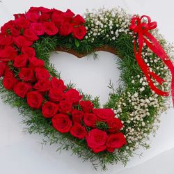 Remarkable Red Rose with white Baby Breath fillers Heart Shape Bouquet to Marmagao