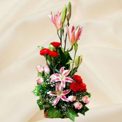 Stylish Arrangement of Pink Lilies with Red Carnations N Pink Roses