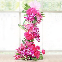 Designer Tall Arrangement of 50 Assorted Flowers to Punalur