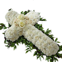 Stunning Cross Arrangement of White Flowers to Uthagamandalam