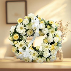 Pristine Assorted White N Yellow Flowers Wreath to Uthagamandalam