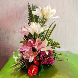 Stunning Lilies N Anthodium Basket Arrangement to Punalur