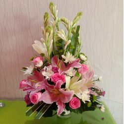 Exquisite Arrangement of Mixed Flowers to Punalur