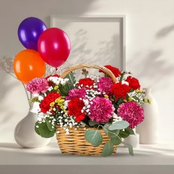 Amazing Display of Mixed Carnations in a Basket with Balloons