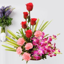 Blooming Summer Delight Premium Arrangement of Mixed Flowers to Punalur