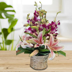 Lovely Pink Oriental Lilies n Purple Orchids Arrangement to Punalur