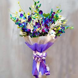 Beautiful Blue n White Orchids Bouquet with Tissue Wrapping