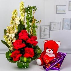 Glorious Combo of Fresh Flowers with Teddy n Cadbury Chocolates to Alwaye