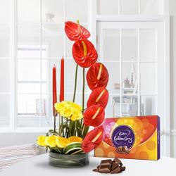 Stylish Flower Arrangement with Candles n Cadbury Celebration to Alwaye