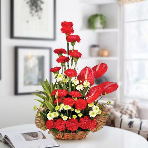 Lovely Arrangement of Red Carnations n Anthurium to Marmagao