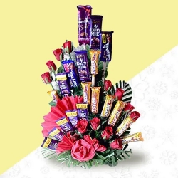 Unique Arrangement of Cadbury Chocolates with Roses to Alwaye