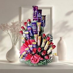 Unique Arrangement of Cadbury Chocolates with Roses to Kanjikode