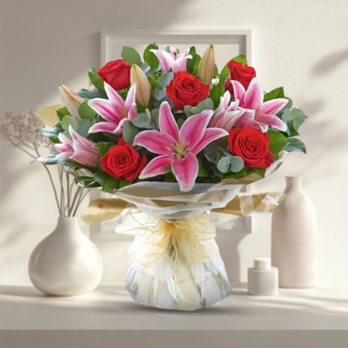 Exquisite Hand Bunch of Pink Lilies & Red Roses
 to Alwaye