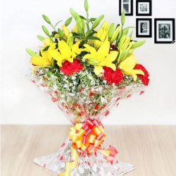 Exquisite Bouquet of Yellow Lilies N Red Carnations