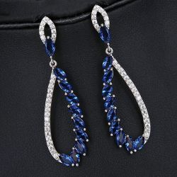 Opulent Crystal Studded Dangler Earrings to Nipani