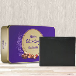 Stylish Black Leather Wallet with a Cadbury Rich Dry Fruits Chocolate to Irinjalakuda