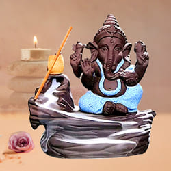 Marvelous Bal Ganesha Smoke Fountain Polyresin Showpiece to Aizwal