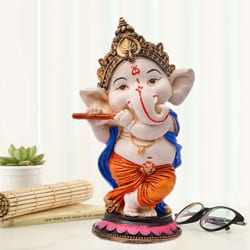 Decorative Lord Ganesha Polyresin Sculpture to Vakadu