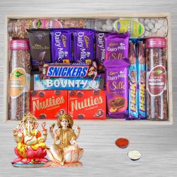 Tasty Snacks n Chocolate Hamper with Laxmi Ganesh Idol N Roli Teeka n Chawal