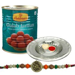 Appealing Ganesh Rakhi With Silver Puja Thali And Gulab Jamun to Rakhi-to-newzealand.asp