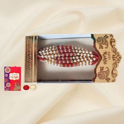 Wonder Glaze White Red Stone Rakhi to Rakhi-to-newzealand.asp