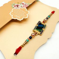 Chic Peacock Feather Stone Rakhi on Card to Rakhi-to-newzealand.asp